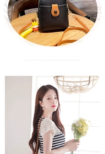 Detail of black lychee grain PU crossbody bag with yellow tiger charm and model display