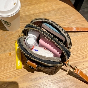 Brown litchi pattern PU crossbody phone bag with multi-layer zipper compartments