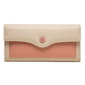 Detail of camellia flower ornament and quilted pattern on beige and pink wallet