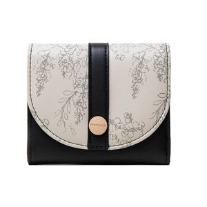 Detailed view of women's floral PU leather wallet with Prettyzys embossed snap button