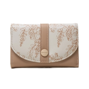Close-up of Prettyzys floral printed wallet with a secure golden metal clasp detail