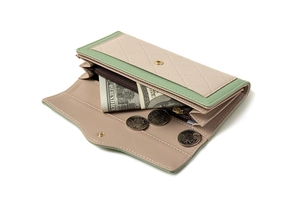 Interior detail of a bicolor long wallet showing card slots and zipper coin pocket