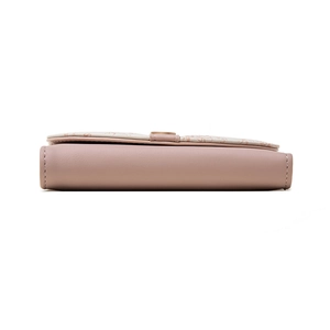 Side view detail showing the compact folded thickness and texture of the pink PU wallet