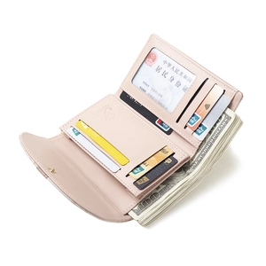 Detail view of pink PU leather wallet with multiple card slots and cash compartment