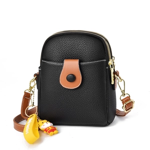 Black lychee textured PU leather crossbody phone bag with brown accents and tiger charm