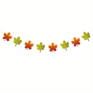 Close-up of fall maple leaf banner for Thanksgiving party decor with realistic textures