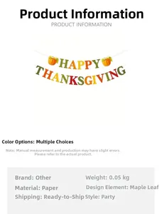 Detail view of Happy Thanksgiving paper banner with maple leaves and pumpkin design