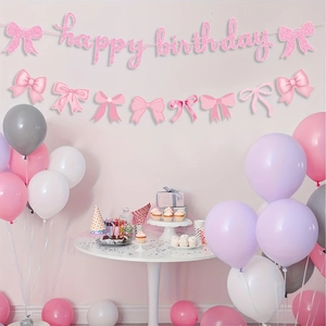 Pink glittery Happy Birthday banner with bow pendants for party decoration set