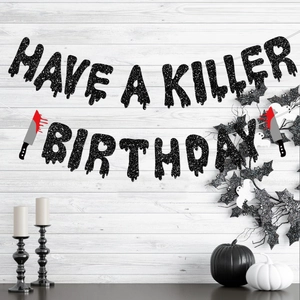 Have a Killer Birthday Halloween banner with glitter black letters and bloody knife decor