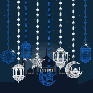 Detail of glitter Ramadan Eid hanging ornaments with moon and star cutout designs