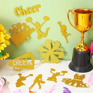 Glitter gold cheerleader table confetti featuring pom-poms and megaphones for parties