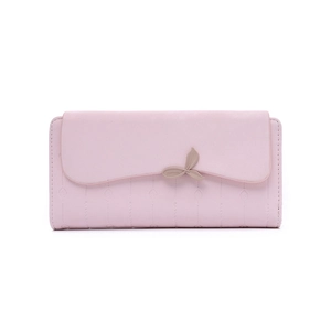 Detail of pink long wallet featuring leaf-shaped clasp and vertical embossed leaf patterns