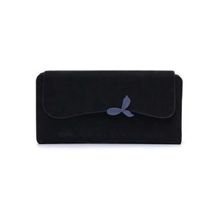 Detail of black long wallet featuring suede texture and decorative blue leaf buckle