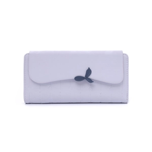 Close-up of lavender faux leather wallet with blue leaf buckle and PRETTY text