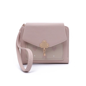 Detailed view of pink lychee leather wallet with heart pattern and cloud metal clasp