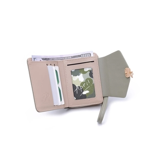 Short PU leather wallet for women with wristlet and golden hardware in sage green