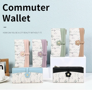 Detail view of colorful floral PU leather commuter wallets with floral metal clasps