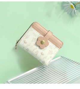 Close-up of floral print PU leather wallet with pink flower buckle on acrylic stand