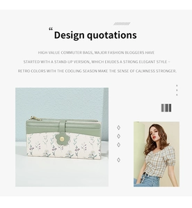 Close-up of light green PU leather wallet with floral patchwork and flower snap button