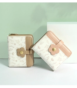 Close-up of floral bifold wallets with 3D flower clasp and multiple card slots