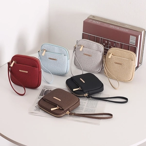 Fashionable women's mini wallet set in six colors with gold logo and wrist strap