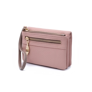 Close-up of dusty pink textured leather wallet with double zippers and leaf charm
