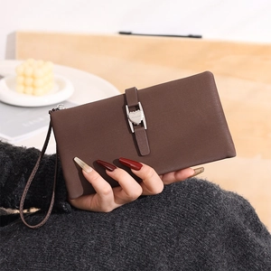 Women's long PU leather wallet in dark brown with heart buckle and wrist strap