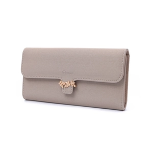 Close-up of elegant taupe textured PU leather wallet featuring a golden leaf metal ornament