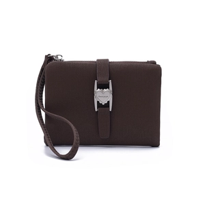 Detailed view of brown textured leather wallet with a silver heart-shaped metal clasp