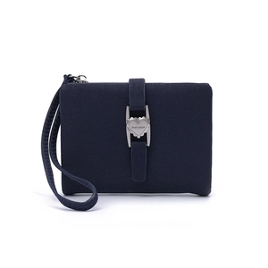 Detail of navy blue textured women's wallet with heart-shaped metal buckle and wrist strap