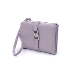 Detail of lavender PU leather wallet featuring a silver heart buckle and wrist strap