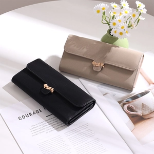 Minimalist long PU leather wallets for women with gold leaf clasp in black and beige