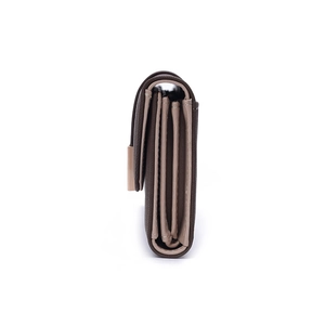 Detail view of the multi-layer interior and side oil edge of this dark brown PU leather wallet