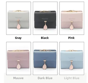 Short tri-fold women's wallets in six pastel colors with metal leaf charm and snap closure