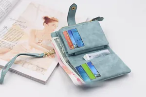 Detail view of light blue matte wallet interior with card slots and zipper pocket