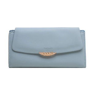 Detail of light blue PU leather long wallet with golden leaf clasp and leaf texture