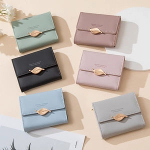 Minimalist short fold wallet for women with golden leaf buckle in multiple colors