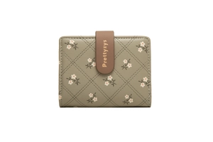 Close-up of grey-green PU leather wallet with floral print and quilted texture