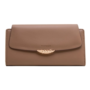 Detail of a brown PU leather long wallet with golden feather accent and brand logo