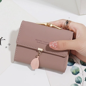 Short tri-fold PU leather wallet in dusty rose with leaf pendant and metal clasp closure