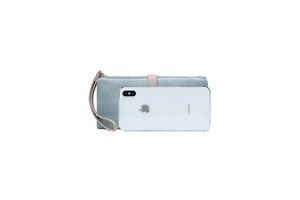 Blue matte leather long wallet with wrist strap next to a phone for size reference