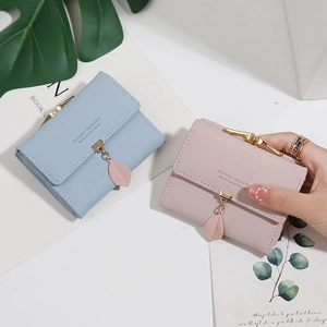 Three-fold PU leather women's wallet with leaf pendant in light blue and pink colors