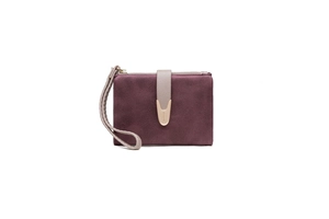Detailed macro view of retro matte purple wallet with wrist strap and gold metal clasp