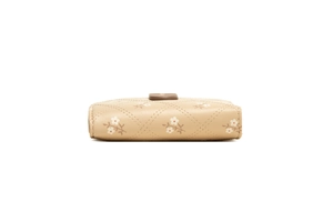 Side view of beige PU leather wallet featuring quilted stitching and floral pattern