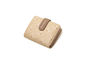 Detailed close-up of a beige floral quilted PU leather wallet with snap closure