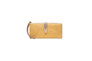Detailed macro view of ginger yellow suede wallet with gray wrist strap and magnetic buckle