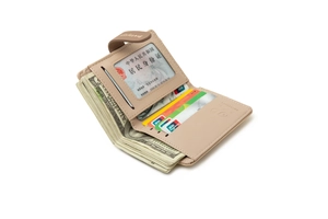 Interior detail of a brown PU leather folding wallet with card slots and a clear ID window