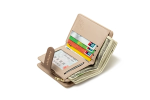 Detail of short beige PU leather wallet showing multi-card slots and bill compartment