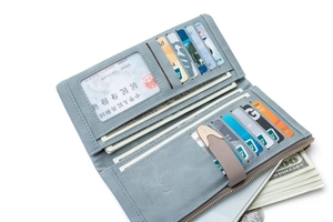 Detailed interior view of a soft matte long wallet showing multiple card slots and cash pockets