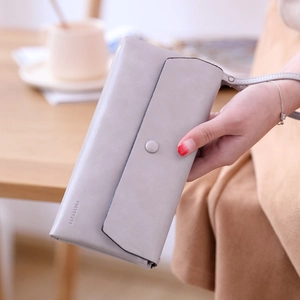Close-up of a long PU leather wallet in lavender grey featuring an elegant wrist strap